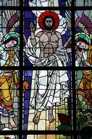 Figurative design using the lead lines and minimal glass paint in the 13th-century manner combined with the texture of Cathedral glass, Ins, Switzerland