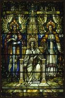 Religion Enthroned, J&R Lamb Studios, designer Frederick Stymetz Lamb (c. 1900). Brooklyn Museum. This piece features symmetrical design, "Aesthetic Style", a limited palette and extensive use of mottled glass.