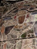 Thomas Becket window from Canterbury showing the pot metal and painted glass, lead H-sectioned cames, modern steel rods and copper wire attachments