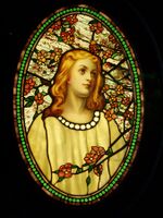 Many of the distinctive types of glass invented by Tiffany are demonstrated within this single small panel, including "fracture-streamer glass" and "drapery glass".