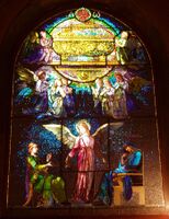 The Angel of Help, John La Farge, North Easton, MA, shows the use of tiny panes contrasting with large areas of opalescent glass. Window restored by Victor Rothman Stained Glass, Yonkers NY.