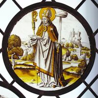 Renaissance roundel using only black or brown glass paint, and silver stain. The bishop-saint Lambrecht of Maastricht stands in an extensive landscape, 1510–20. Diameter 8 3⁄4 in (22 cm). Designed to be placed low, close to the viewer.