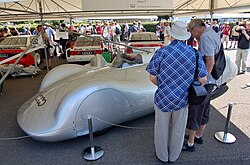 A streamliner car on display