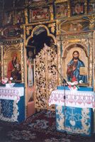 Gilded royal doors carved to represent the tree of life (old wooden church in Chotyniec, Poland ).