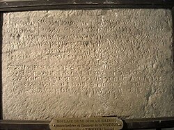 Image of engraved letters on an ancient stalea