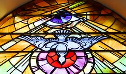 Stained glass, Holy Family Church, Teconnaught, September 2010 crop.jpg