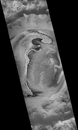 Playfair (Martian crater), as seen by CTX camera (on Mars Reconnaissance Orbiter). Dark dots are places where frost has disappeared.
