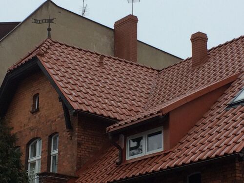 Detail of the gable and the weather vane