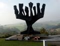 Menorah memorial of the State of Israel with memorial wreaths, KZ Mauthausen memorial, Austria