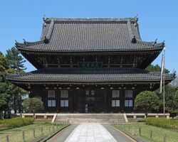 Two story pagoda in dark wood