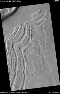 Well-developed hollows, as seen by HiRISE under the HiWish program. Location is the Casius quadrangle. Note: this is an enlargement of the previous image that was taken by CTX.