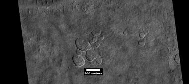 Scalloped ground, as seen by HiRISE under HiWish program