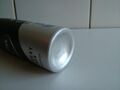 Picture of the bottom of an aerosol spray can.