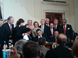 Obama signing health care-20100323.jpg