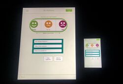 Photograph of a screen from the "Wellmind" smartphone application