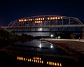 The Colorado River flows through Yuma, AZ right before reaching Mexico. This is the Ocean to Ocean bridge at night in Yuma in 2013.