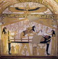 Fresco of a mummy lying on a bier. Women stand at the head and foot of the bier, while a winged woman kneels in the register above