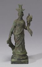 Metal figurine of a woman