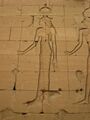 Relief of a woman in Egyptian clothing with an elaborate headdress