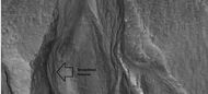 Close-up of gullies, as seen by HiRISE under HiWish program. Streamlined features in the channels are suggestive of a formation by running water. Location is Diacria quadrangle.