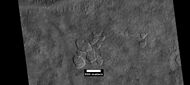 Scalloped ground, as seen by HiRISE under HiWish program.