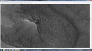 Close-up of East side (right side) of previous image of pedestal crater showing polygons on lobe. Since the margin of the crater has lobes and polygons, it is believed there is ice under the protective top. Picture taken with HiRISE under HiWish program. Note: this is an enlargement of the previous image.