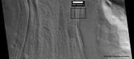 Context picture showing origin of next picture. The location is a region of lineated valley fill. Image from HiRISE under HiWish program.