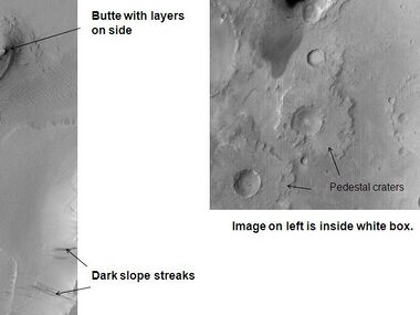 Tikhonravov Crater floor in Arabia quadrangle, as seen by Mars Global Surveyor. Click on image to see dark slope streaks and layers.