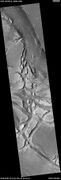 Wide view of Buttes and Mesas, as seen by HiRISE under HiWish program Location is Elysium quadrangle.