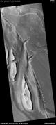 Streamlined shapes, as seen by HiRISE under HiWish program Location is the Elysium quadrangle.