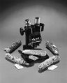 Greenough-type microscope with discrete magnifications controlled by the revolving drum