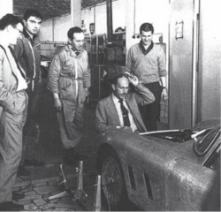 ASA head of operations Niccolò de Nora (kneeling) inspecting an ASAS 1000 GTC alongside staff.