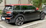 Mini Clubman JCW, demonstrating its split boot doors