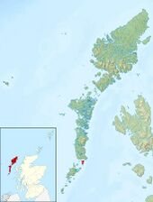 Large scale map showing Eriskay among the Outer Hebrides; an insert shows where the Outer Hebrides are in relation to Scotland