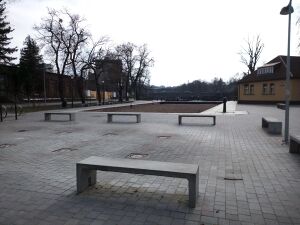Sand filled trapezoidal lock viewed from the street