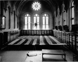 #42 (24/9/1877) The original Star-Spangled Banner flag undergoing restoration work in 1914 in the West Wing of the Smithsonian Institution Building, under the hanging giant squid model, one of the few exhibits not removed for the occasion (see also photograph showing seamstresses at work under the guidance of Amelia Fowler)