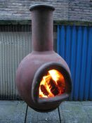 Chimenea, burning wood for heat