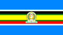 Nine horizontal strips coloured (from top to bottom): blue, white, black, green, yellow, green, red, white, then blue. The emblem of the EAC is placed in the centre.