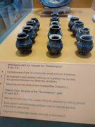 The small cups found in the drains of the prison, believed to be used for administering the poison for executions.