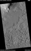 Wide view of hollows that formed as ice left the ground. This was named a HiRISE picture of the day.