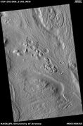 Row of mounds, as seen by HiRISE under HiWish program Arrows point to some of the mounds.