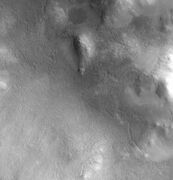 Lyot Crater Channel, as seen by CTX. Water-carved channels have been spotted in Lyot Crater; the curved line may be one. Click on image for a better view.