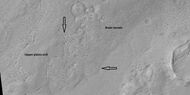 Brain terrain is forming from the breakdown of upper plains unit, as seen by HiRISE under HiWish program Arrow points to a place where fractures are forming that will turn into brain terrain.