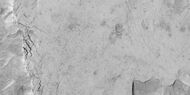 Close-up of blocks being formed, as seen by HiRISE under HiWish program Many long fractures are visible on the surface.