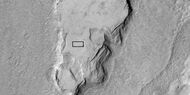 Enlarged view of a part of previous image, as seen by HiRISE under HiWish program. The rectangle represents the size of a football field.
