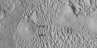 Brain terrain being formed, as seen by HiRISE under HiWish program Note: this is an enlargement of a previous image using HiView. Arrows indicate spots where brain terrain is beginning to form.