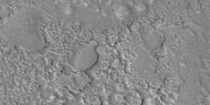Cracks forming on surface and then breaking down, as ice is removed. Picture taken with HiRISE under HiWish program.
