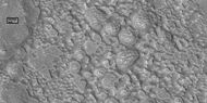 Surface breaking down, as ice is removed, as seen by HiRISE under HiWish program Box shows size of football field.