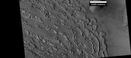 Well developed ribbed upper plains material. These start with small cracks that expand as ice sublimates from the surfaces of the crack. Picture was taken with HiRISE under HiWish program