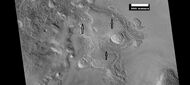 Brain terrain being formed from a thicker layer, as seen by HiRISE under HiWish program. Arrows show the thicker unit breaking up into small cells.